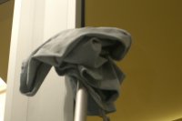 Using cloth on extension pole Drying window edges with cloth