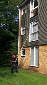 Water fed pole cleaning windows on flats Thanks to TMS Cleaning